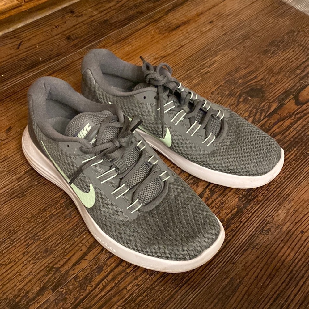 Women’s Nike running shoes, size 10. Gray and mint green